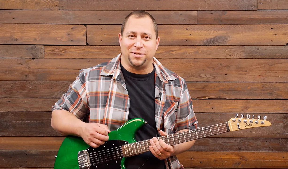 Jonathan Boettcher teaching guitar